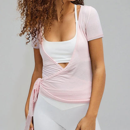 Women’s yoga workout set with slim-fit crop top and matching fitness leggings