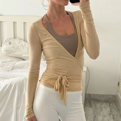 Women’s yoga workout set with slim-fit crop top and matching fitness leggings