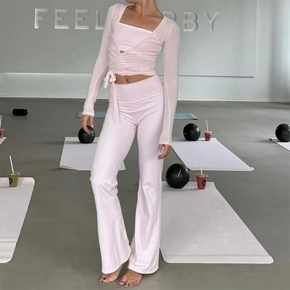 Women’s yoga workout set with slim-fit crop top and matching fitness leggings